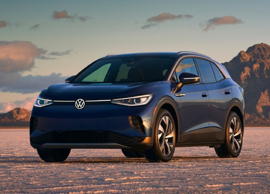 A dark-blue 2021 Volkswagen ID.4 at the Bonneville Salt Flats at sunset