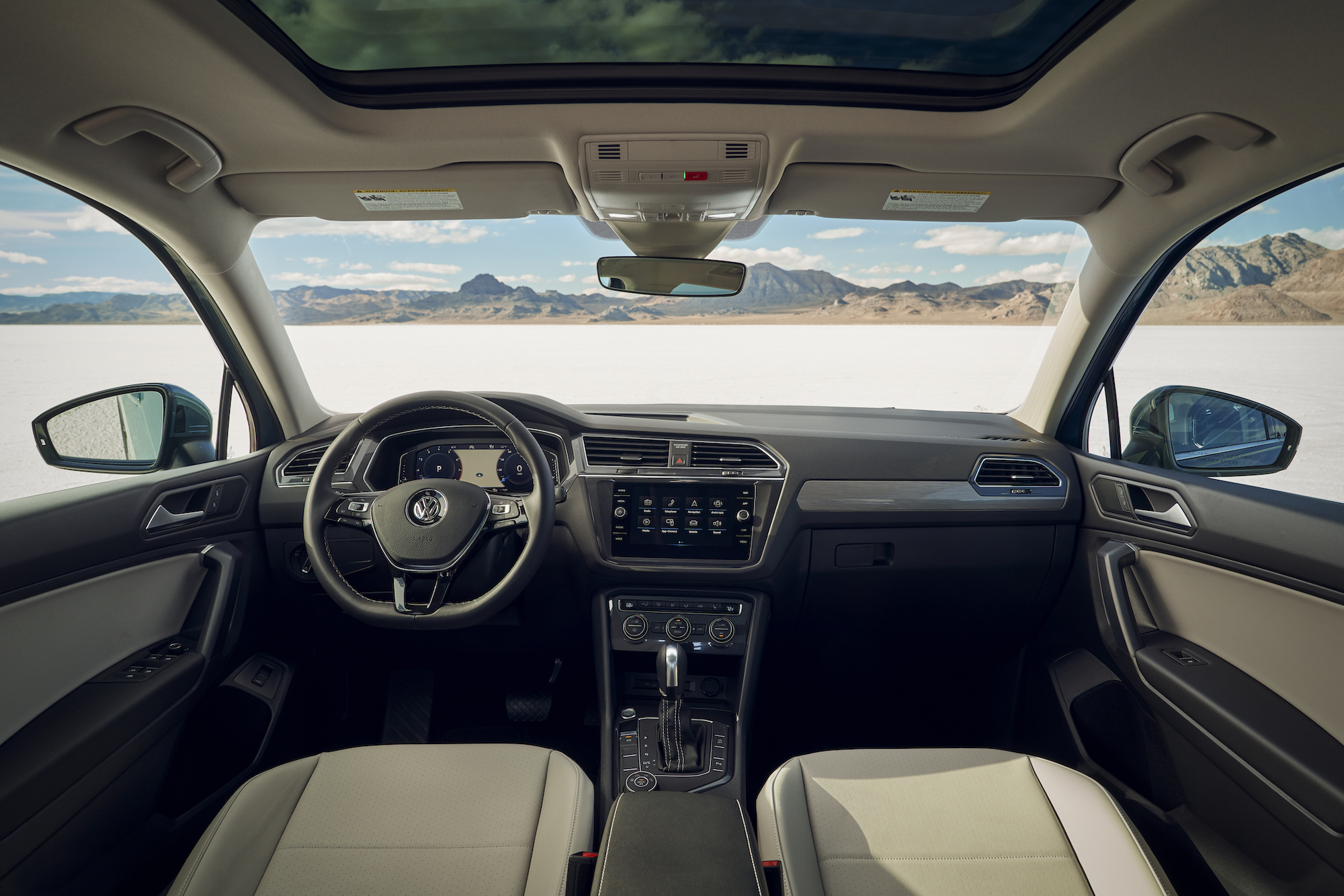 A 2021 Volkswagen Tiguan's gray-and-beige cockpit