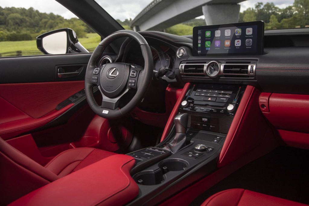 The luxurious red and black leather interior of the 2021 Lexus IS
