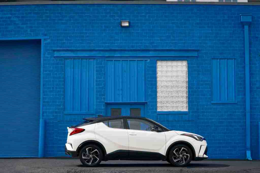 2021 Toyota C-HR parked in front of a blue wall
