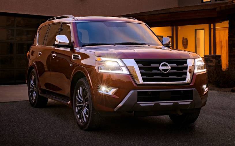 The 2021 Nissan Armada Platinum parked in front of a house