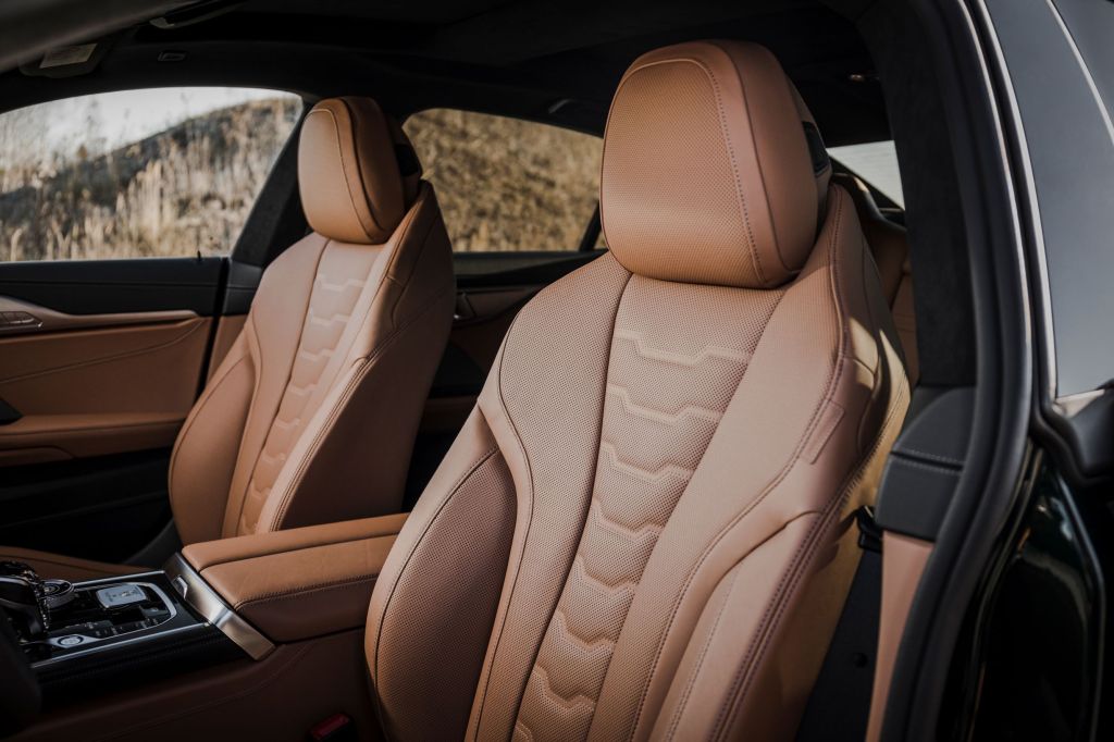 The brown-leather-upholstered interior of the 2022 BMW Alpina B8 Gran Coupe