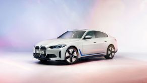 A white-with-blue-elements 2022 BMW i4