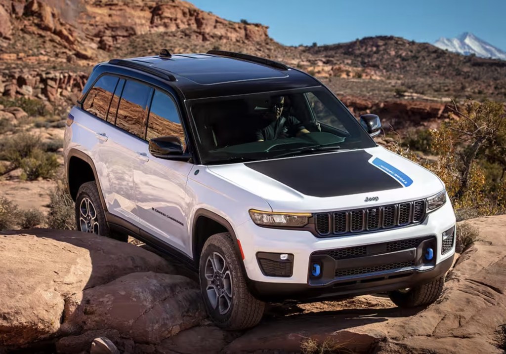 The 2023 Jeep Grand Cherokee off-roading over rocks