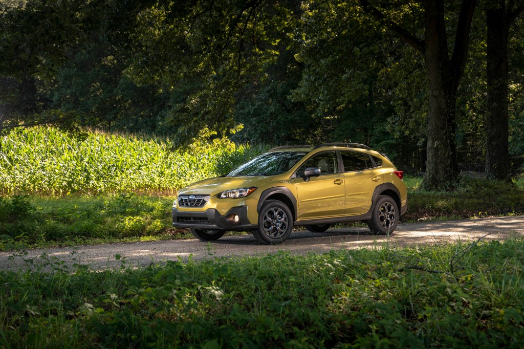 2021 Subaru Crosstrek Sport parked on a wooded road