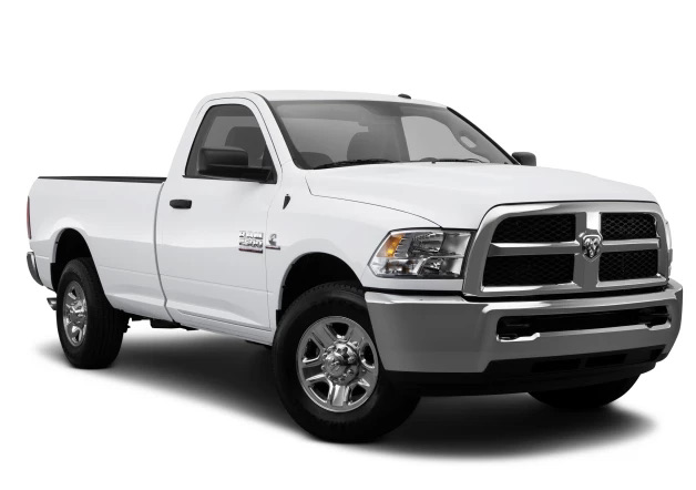 the Ram 1500 used pickup truck model from 2014 in a press photo against a white back drop