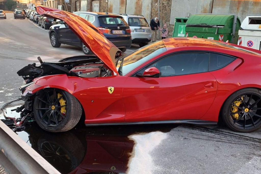 A wrecked Wrecked Ferrari 812 Superfast on the street
