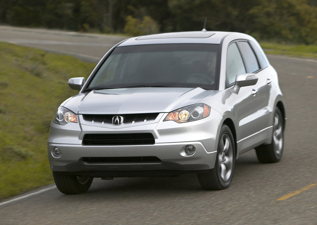 a shot of a silver 2007 Acura RDX driving down the road