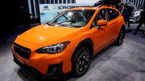 A Subaru Crosstrek displayed at an auto show