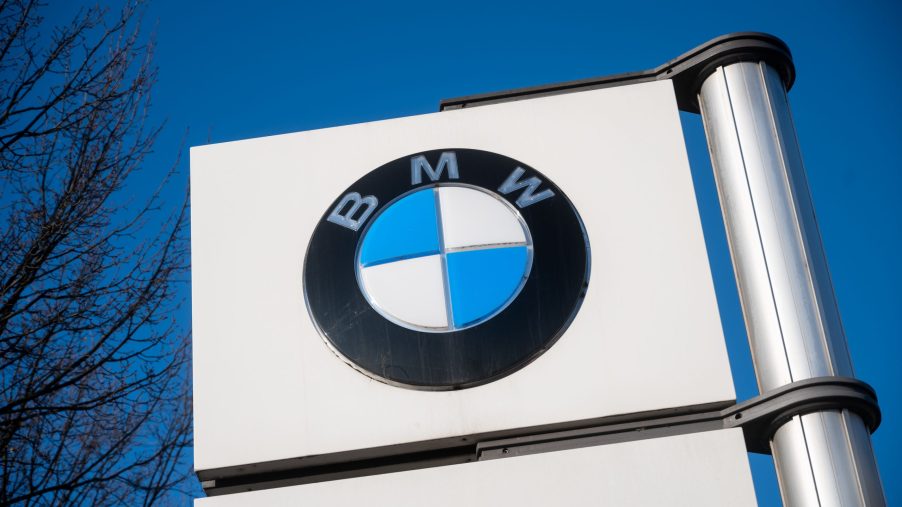 A BMW logo stands in front of the BMW plant in Berlin. At the end of the peace period in the metal and electrical industry, the employees have called for a warning strike