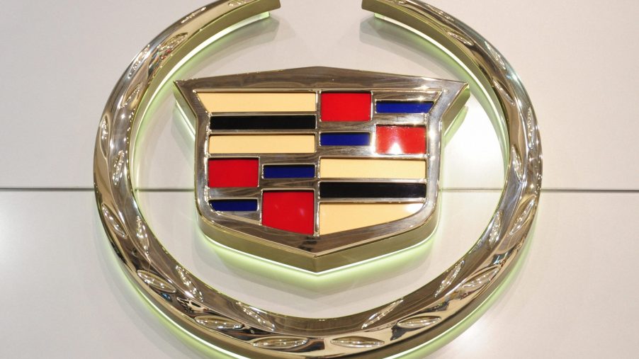 A Cadillac logo displayed on a sign representing one of General Motors luxury brands