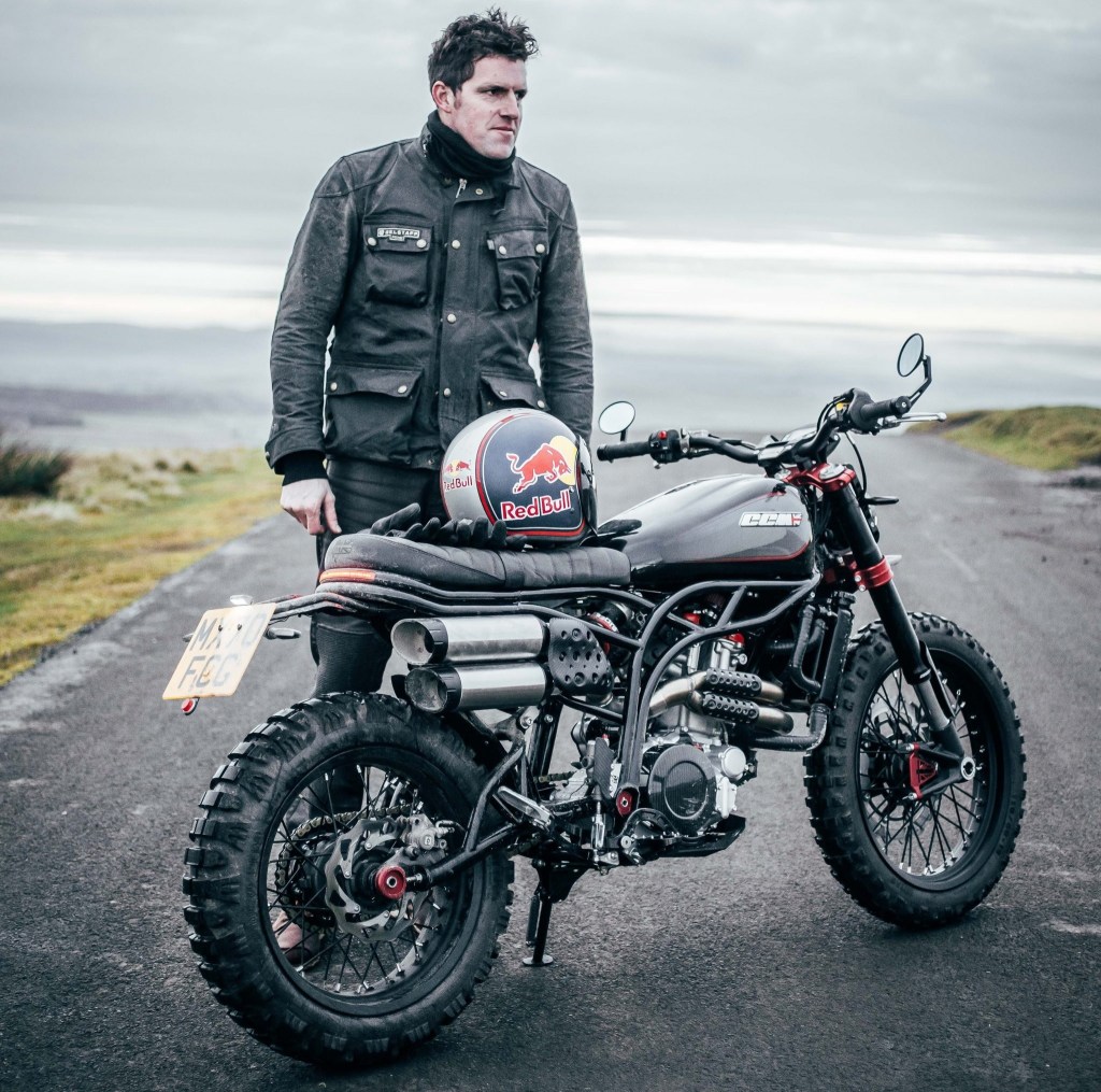British rider Dougie Lampkin with a black-and-red CCM Spitfire Blackout on a road