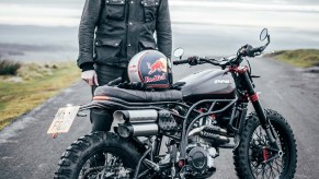 British rider Dougie Lampkin with a black-and-red CCM Spitfire Blackout on a road