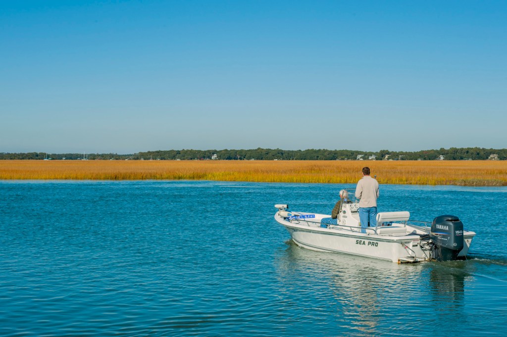 Men in a powerboat on the Intracoastal Waterway at Edisto