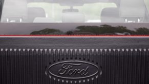 The rear window of a Ford F-150 seen from the bed of the truck