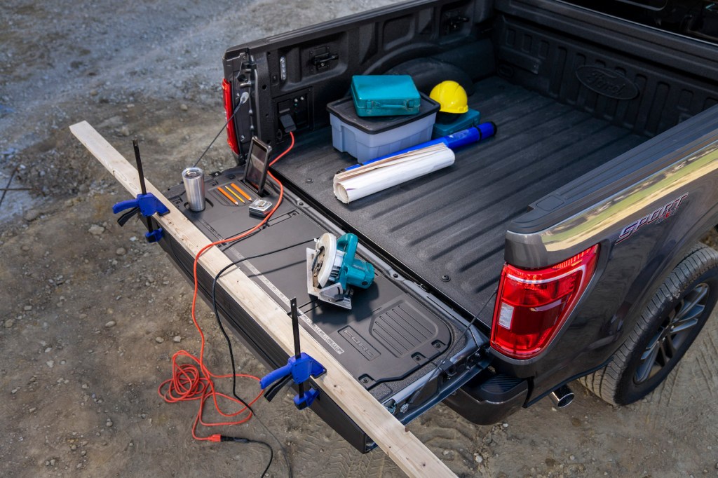 The Ford F-150 features an available tailgate work surface.