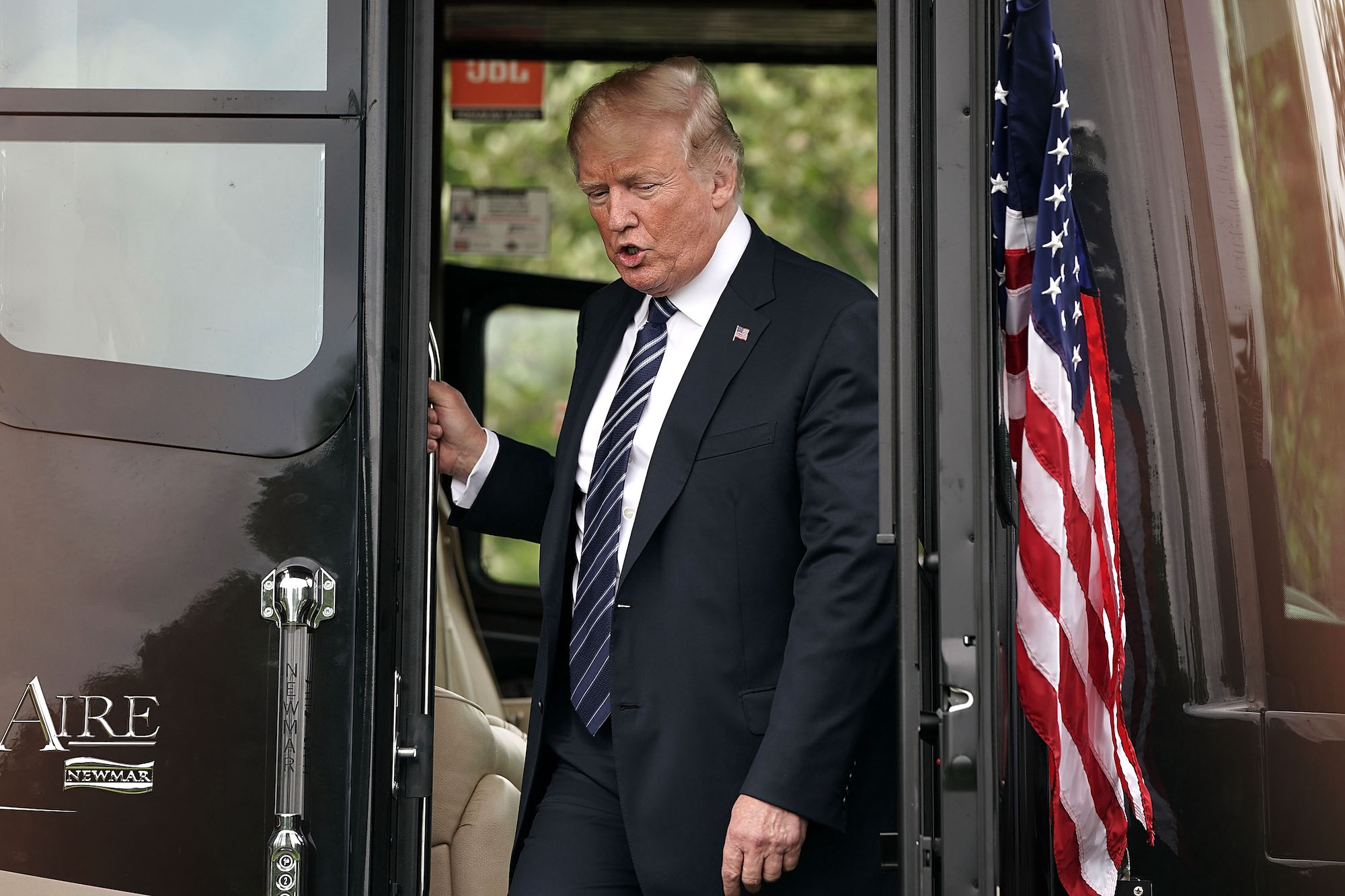 U.S. President Donald Trump tours an RV manufactured by Newmar Corp. during a "Made in America" products showcase on the South Lawn of the White House in Washington, D.C., on Monday, July 23, 2018