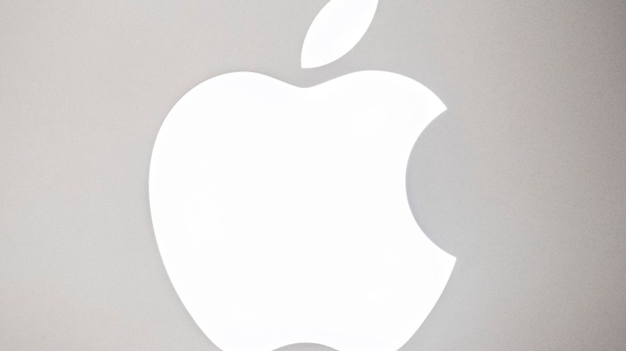 Silver and white Apple logo.Apple got a stern warning from Toyota about entering the car business.