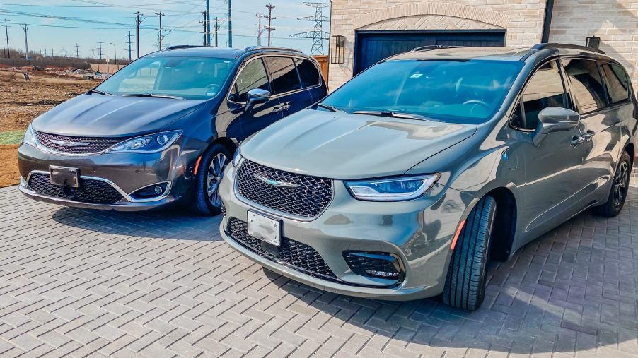 2020 and 2021 chrysler pacifica models in a driveway