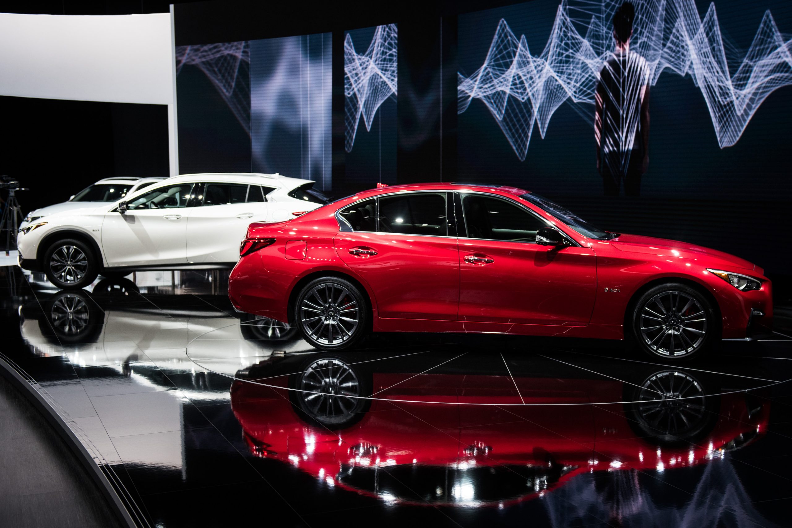 A Nissan Motor Co. Infiniti brand Q50 S vehicle, right, is displayed during the 2017 New York International Auto Show