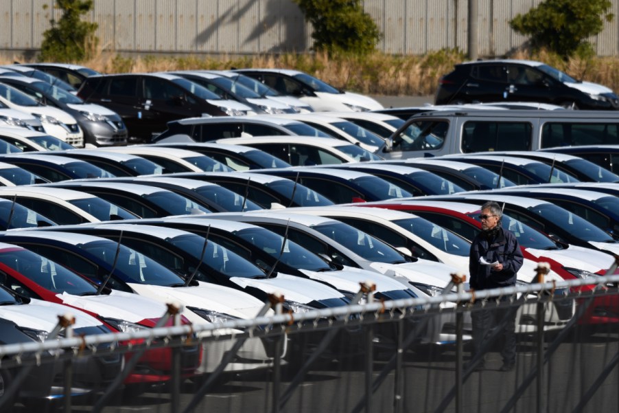 Nissan sedans and other cars stacked up for shipment