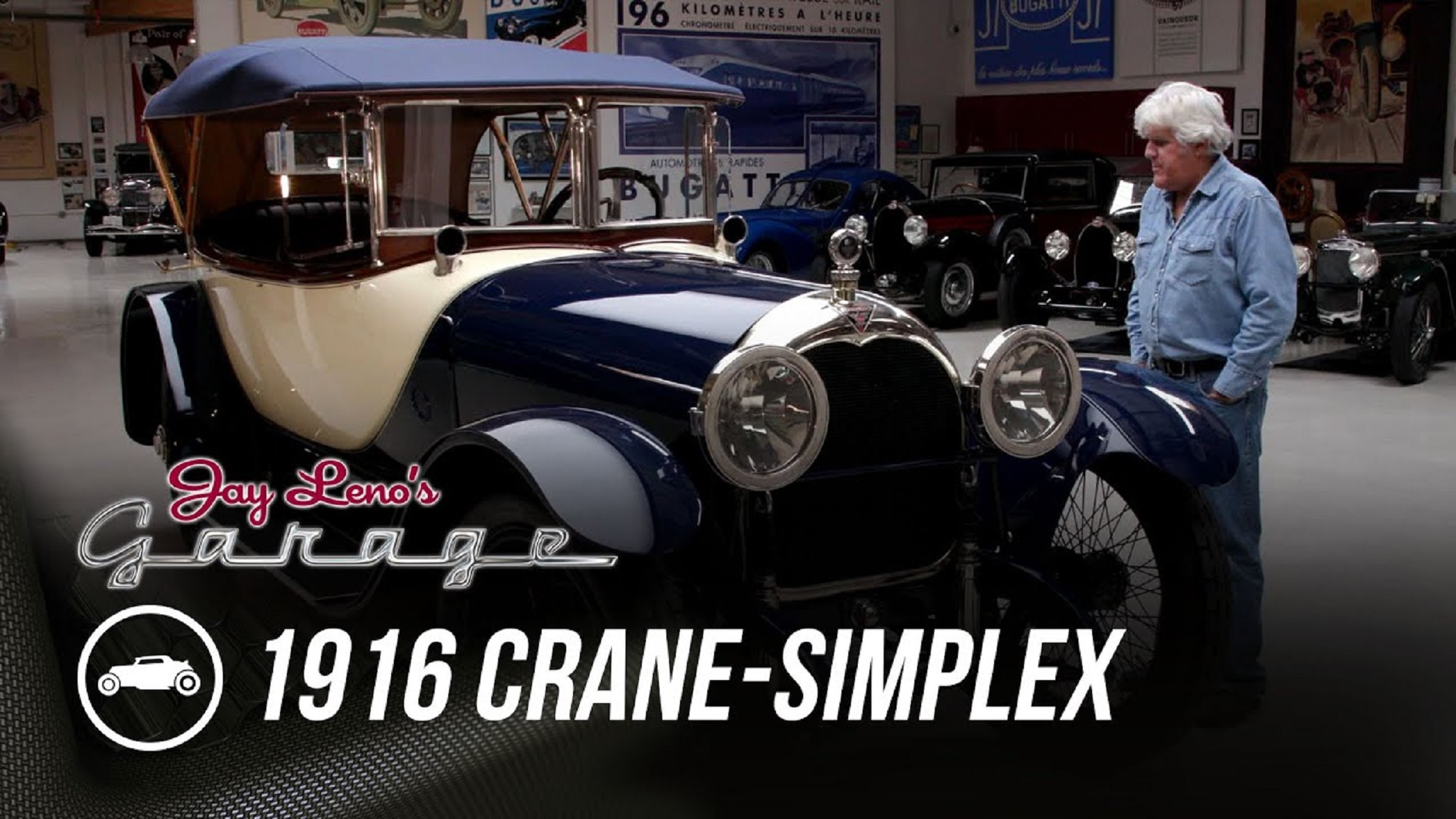 Jay Leno with his blue-and-cream 1916 Crane-Simplex Holbrook Skiff in his garage