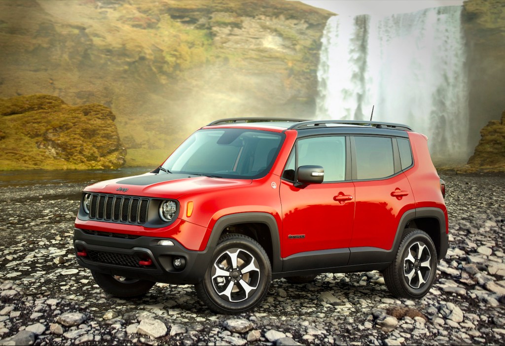2021 Jeep Renegade parked in front of a waterfall