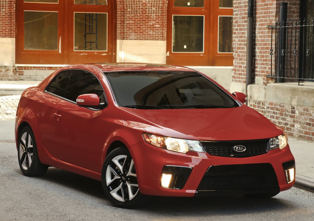 a red 2010 Kia Forte Koup