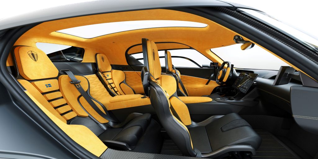 The yellow-leather-upholstered carbon-fiber interior of the Koenigsegg Gemera