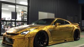 Kuhl Racing gold chrome engraved Nissan GT-R front 3/4 view