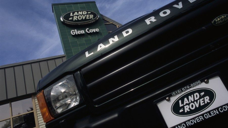 A Land Rover SUV on display outside of a dealership