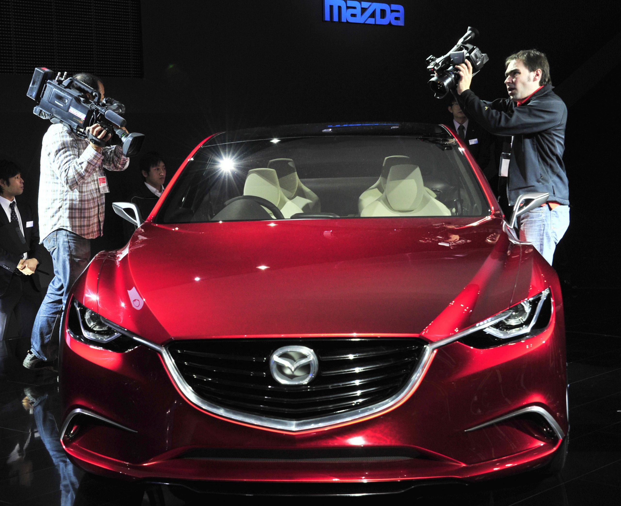 A Mazda diesel car on display t an auto show