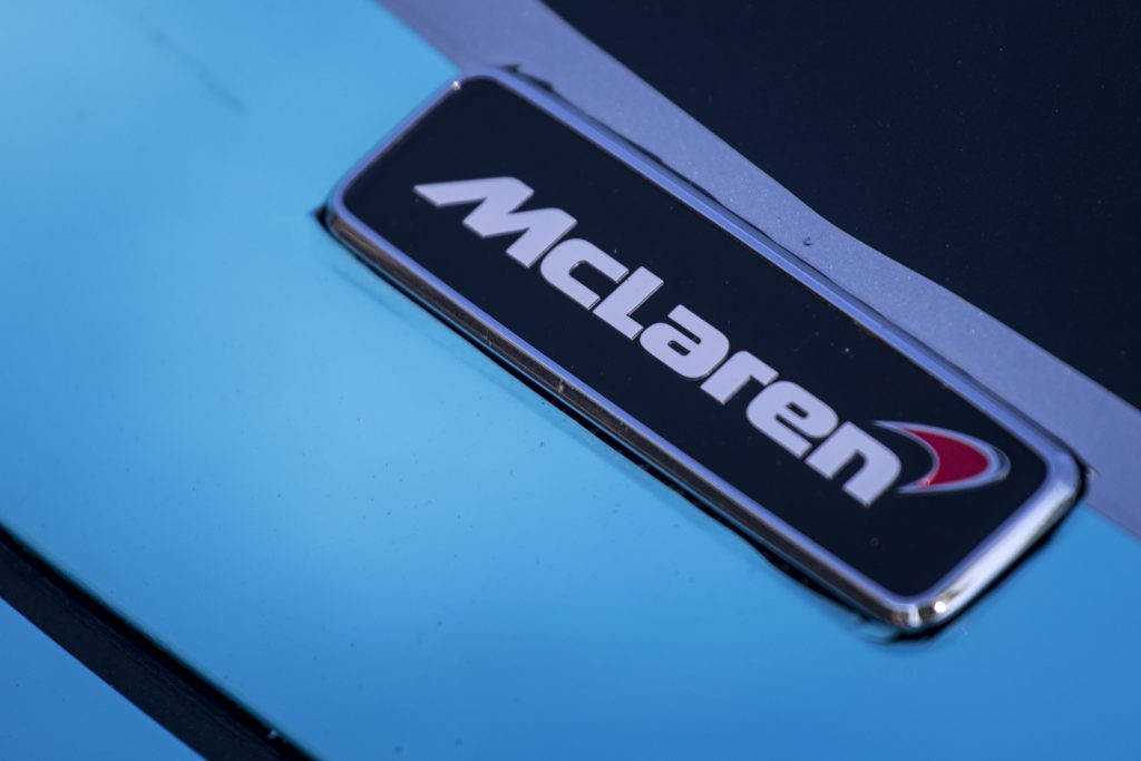 The McLaren logo on a vehicle emblem 