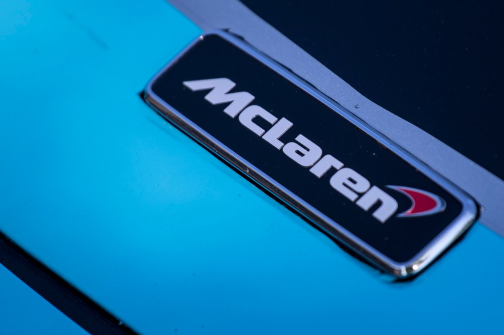 The McLaren logo on a vehicle emblem