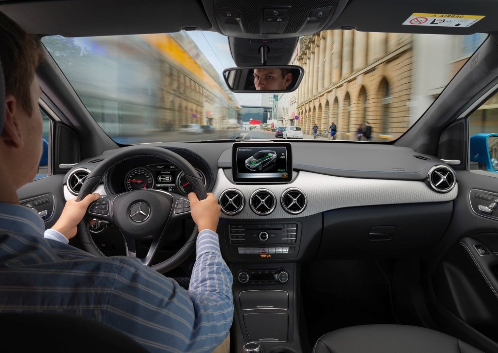 an interior shot of someone driving a 2015 Mercedes-Benz B-Class 