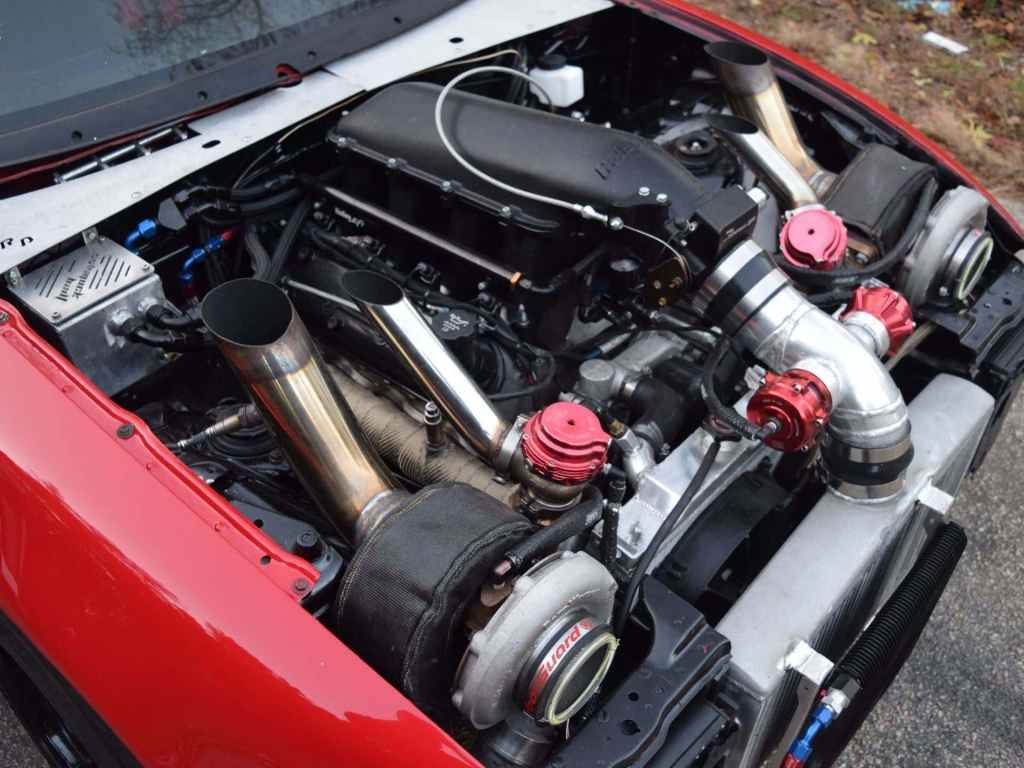 red 1990 Miata with a LS Chevy Silverado motor swap