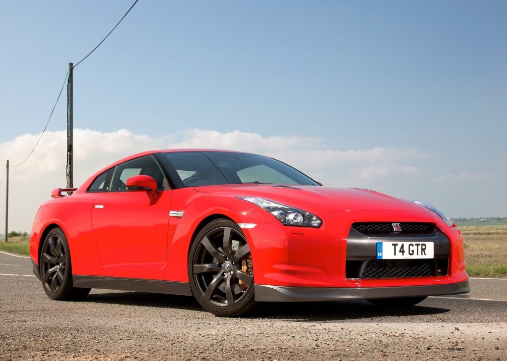 An image of a red Nissan GT-R parked outside.