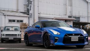 An image of a blue Nissan GT-R parked outside.