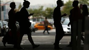 Pedestrians in the shadows