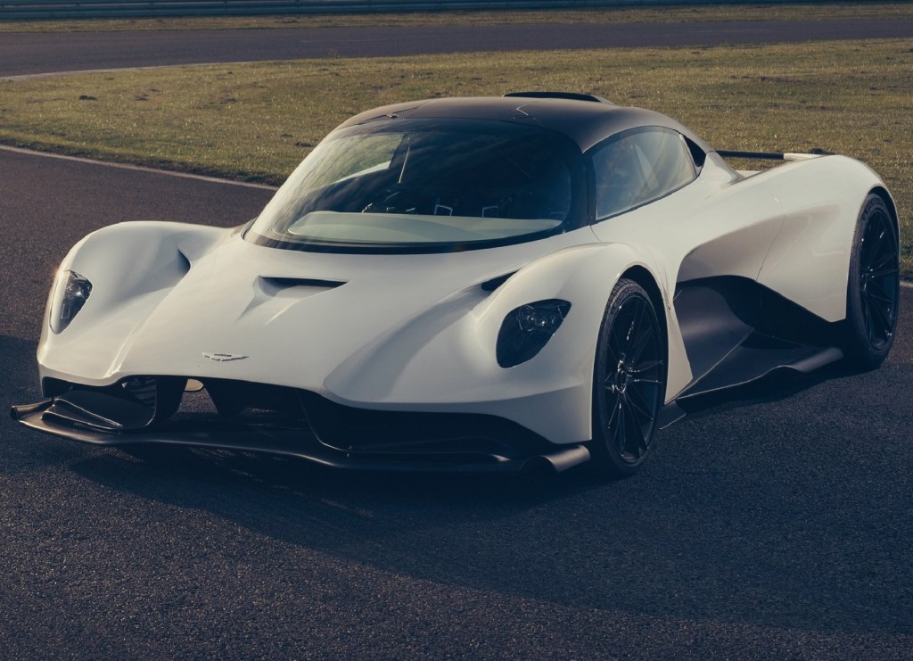 A white pre-production 2020 Aston Martin Valhalla parked on a racetrack