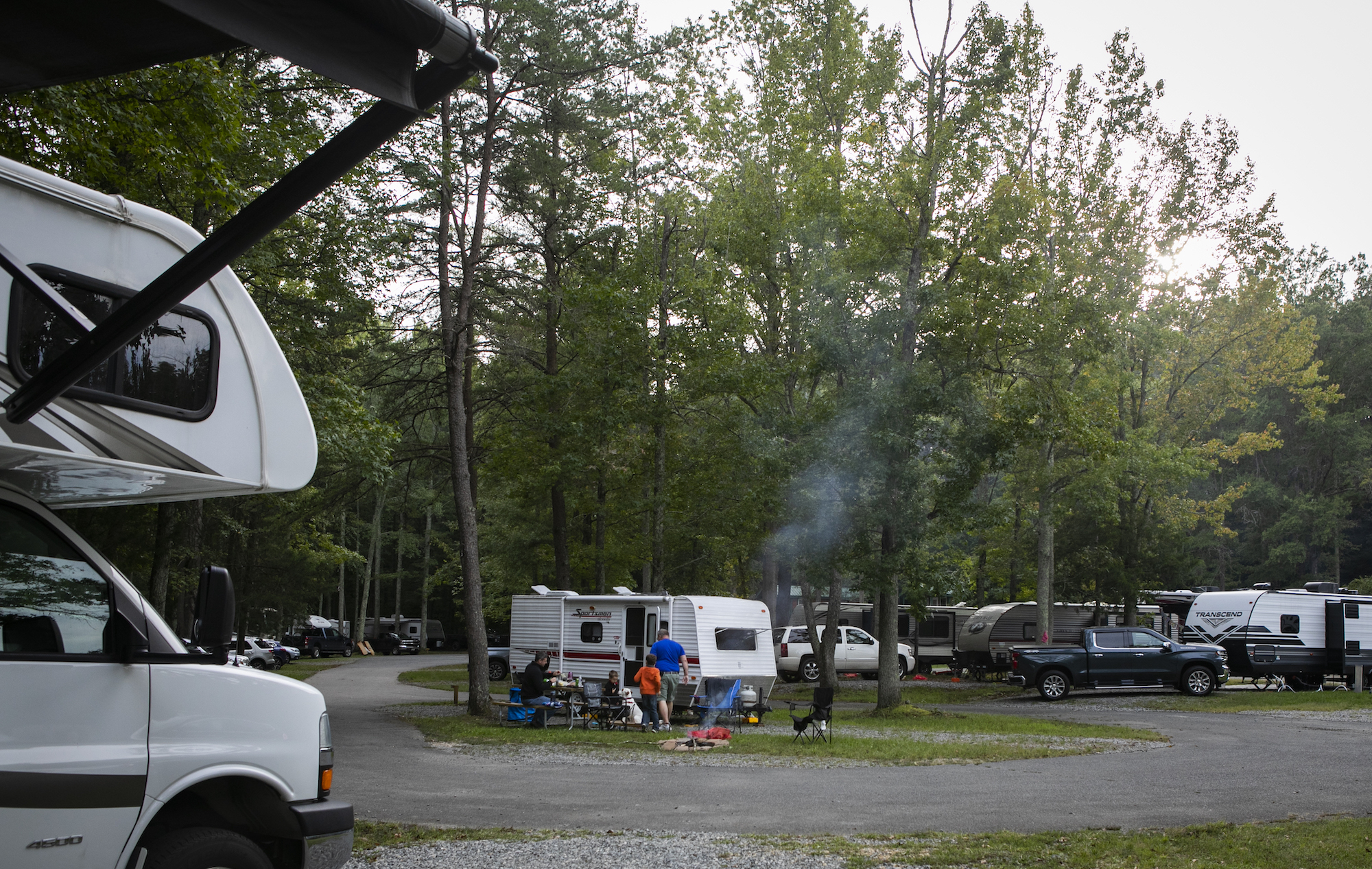 RV campers make a fire at a KOA campground in Fredericksburg, Virginia, on Saturday, September 19, 2020