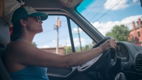 Eileah Ohning sits at the wheel of her Freightliner Sprinter High Top RV on July 15, 2017, in Columbus, Ohio.