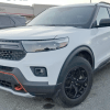 A spy shot of the 2022 Ford Explorer Timberline in a parking lot