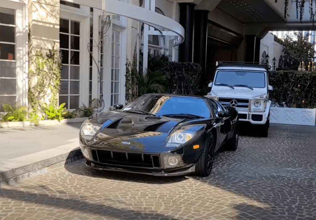 An image of a Ford GT parked outside of a hotel in Beverly Hills.