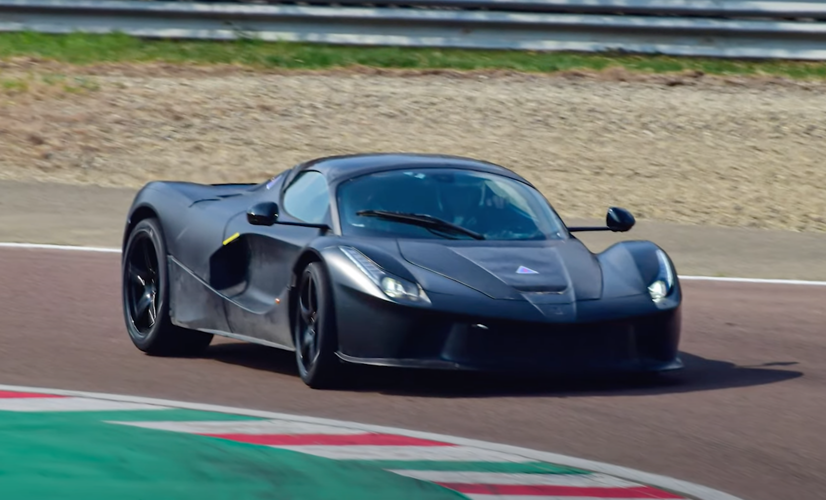 An image of a Ferrari prototype out on track.