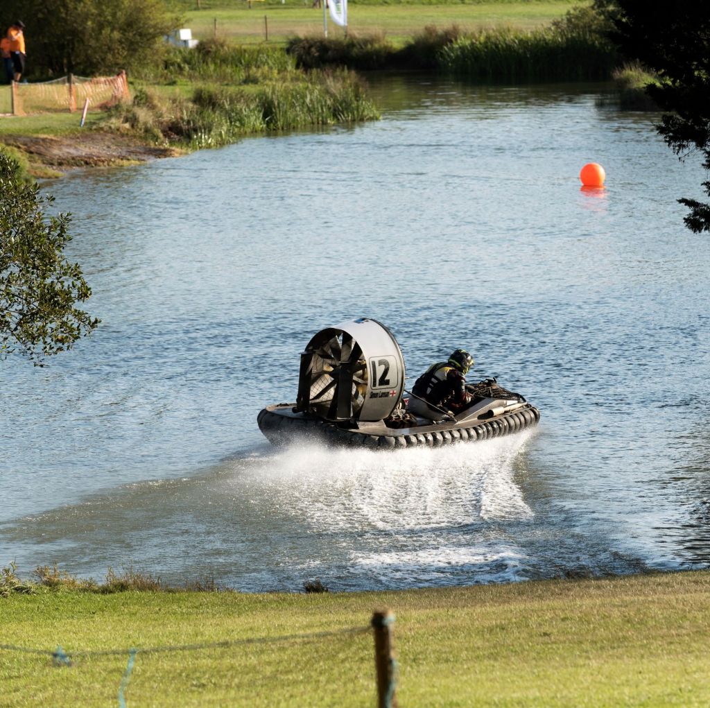 Simon Larman races his silver-and-black hovercraft through the Gang Warily river circuit