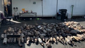 a pile of 250 stolen catalytic converters