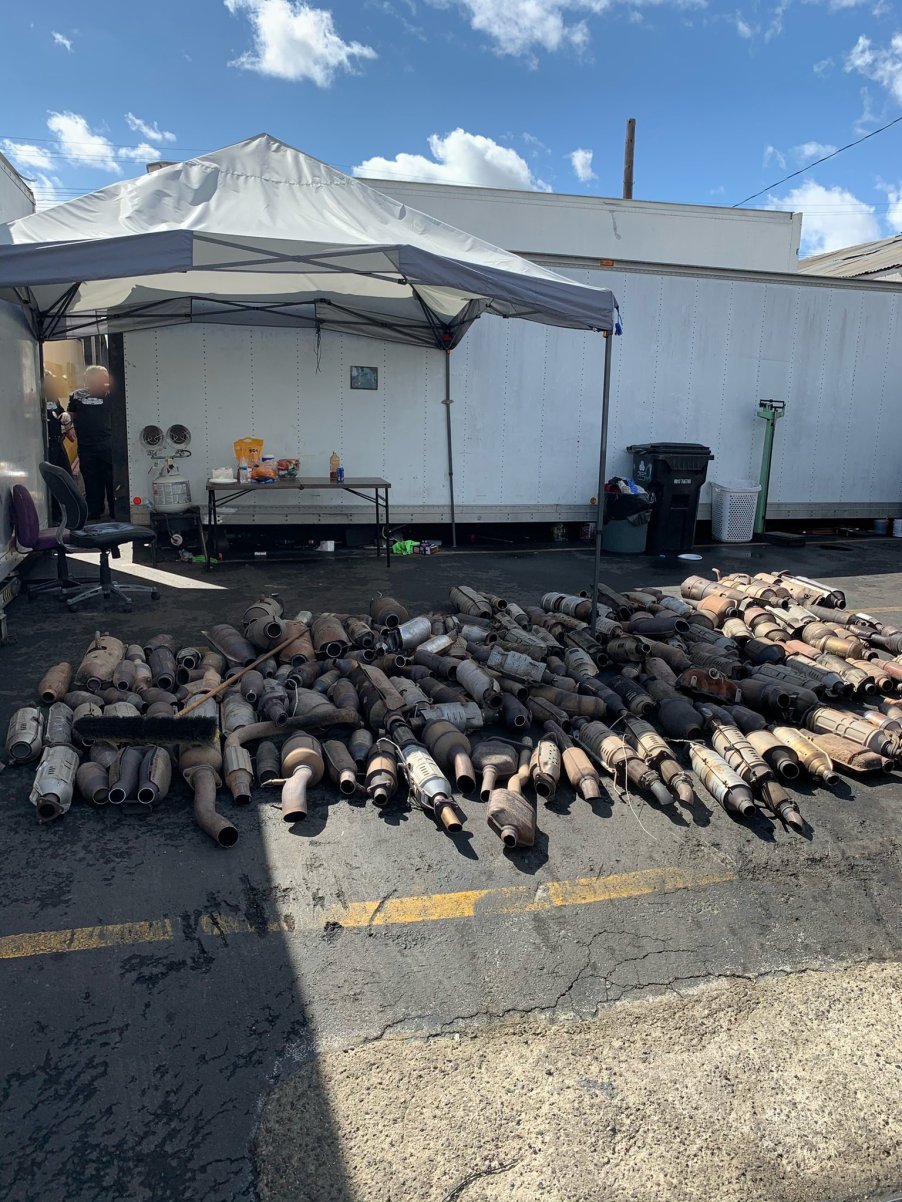 a pile of 250 stolen catalytic converters