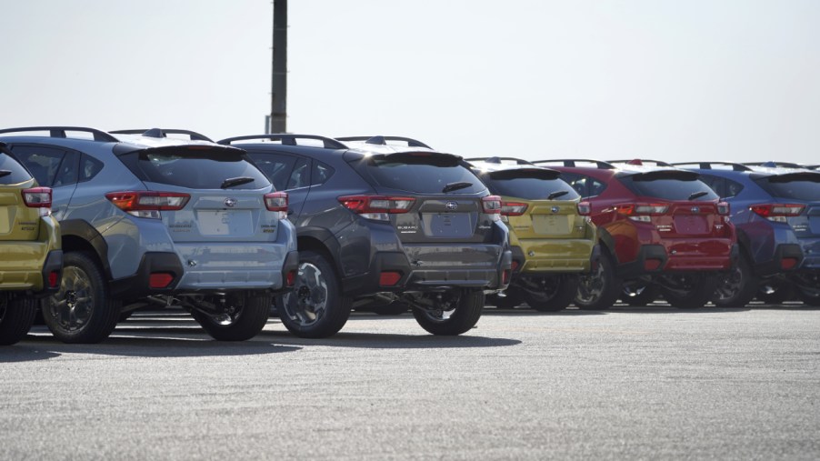 A row of Subaru Crosstrek lined up and ready to be shipped
