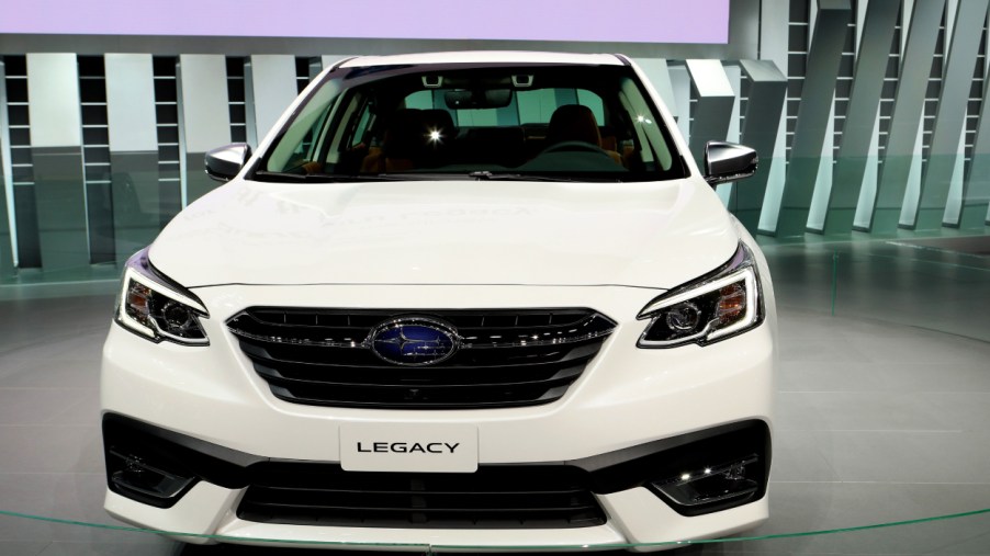 A Subaru Legacy on display at an auto show